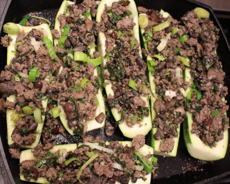 Paleo AIP Stuffed Zucchini Boats -Perfect way to use up all that summer squash & zucchini, not only delicious but pretty too! #aip #paleo #whole30 #keto #lowcarb #glutenfree #zucchini #thehealthnutmama