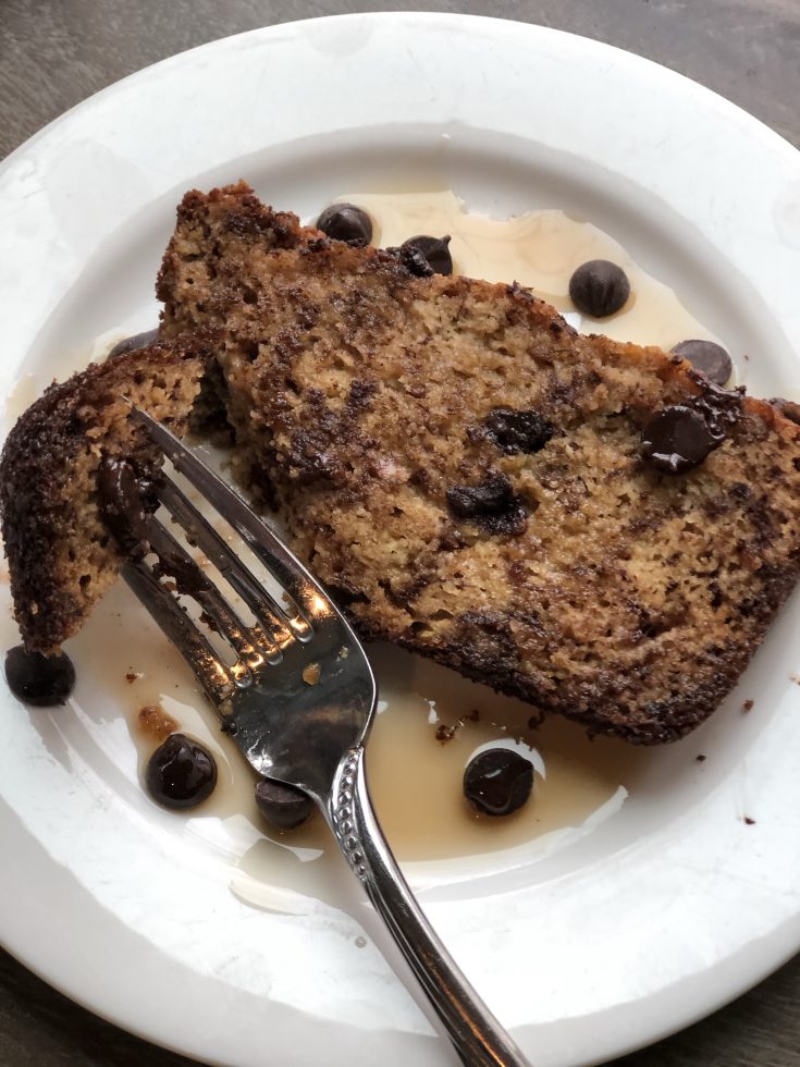 This Paleo Chocolate Chip Banana Bread is so easy & delicious to make. A great way to use up over ripe bananas & satisfy those chocolate cravings at the same time. Gluten Free, Grain Free & Dairy Free. A healthy alternative to the traditional Banana Bread. #paleo #glutenfree #dairyfree #bananabread #chocolatechip #chocolate #healthy #thehealthnutmama